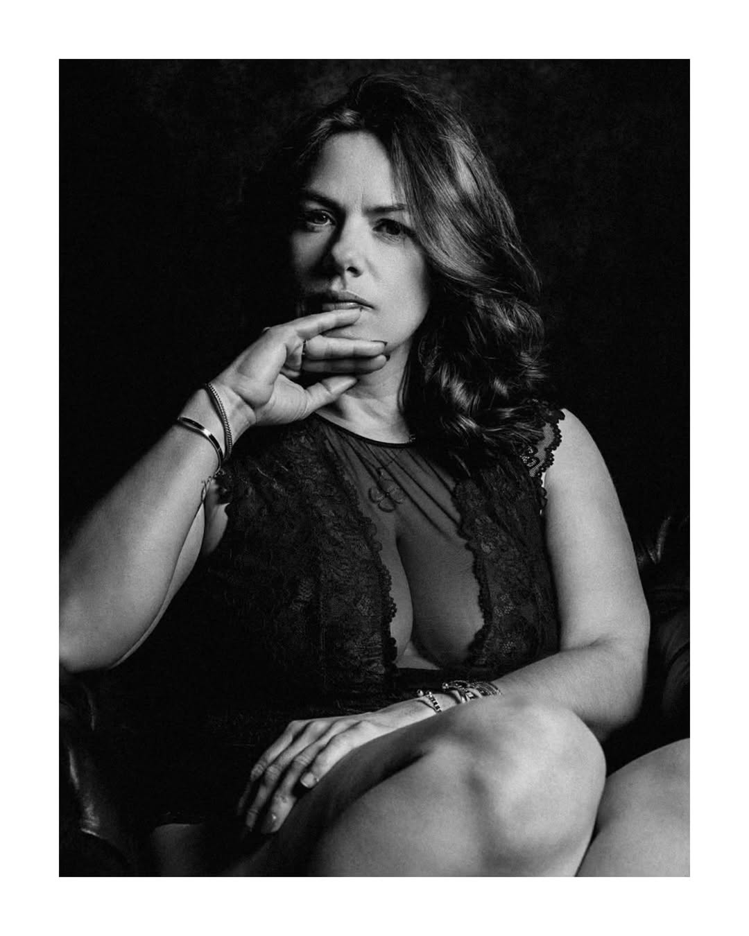 Seated black-and-white portrait of Rousse se Rebelle