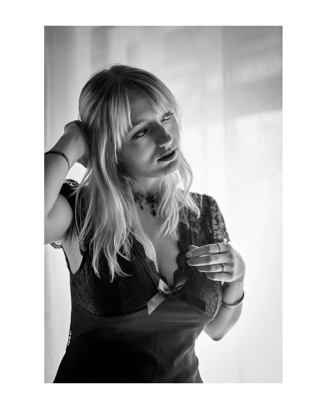 Black-and-white portrait of Nanie in window light