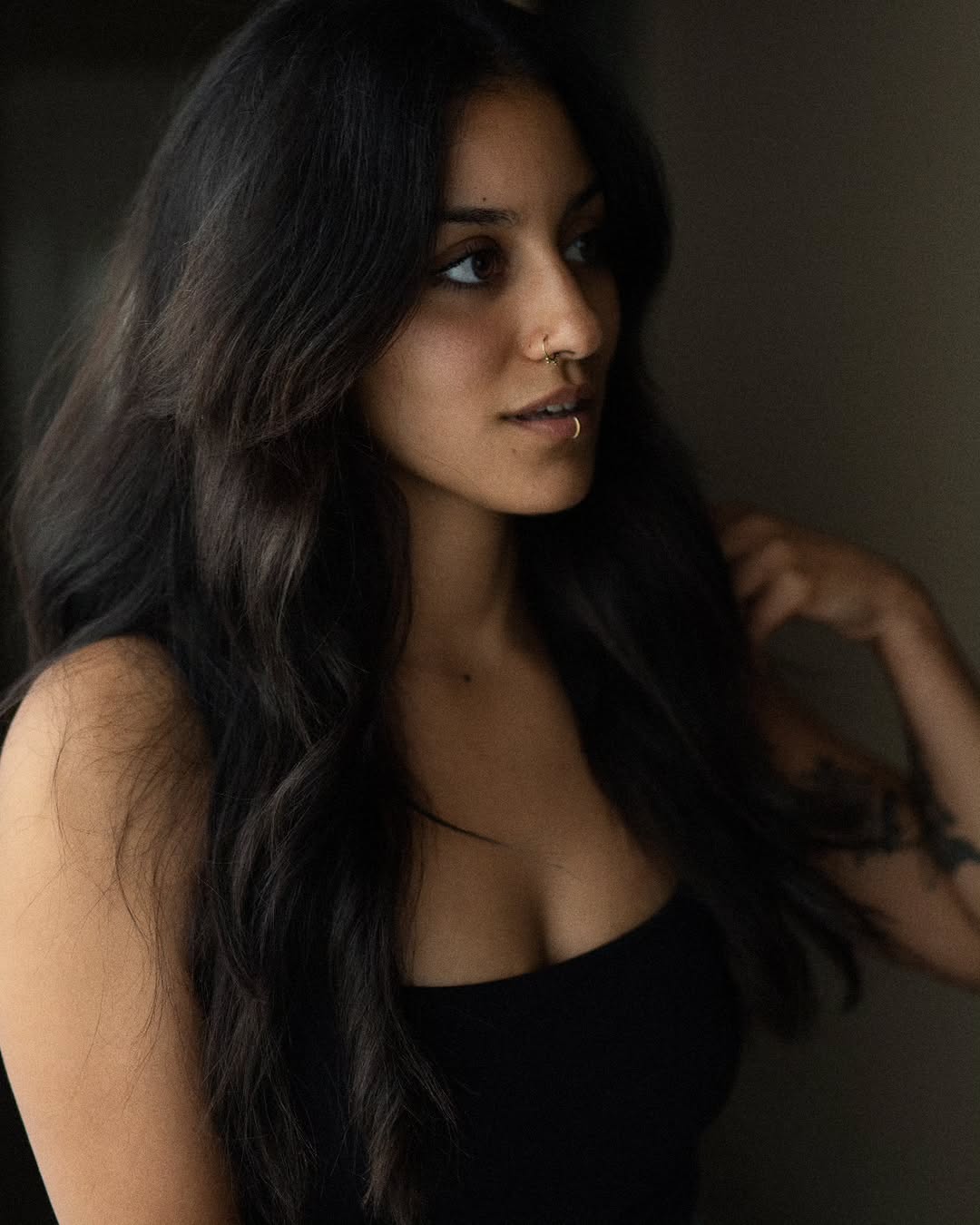 Profile portrait of Océane in soft light